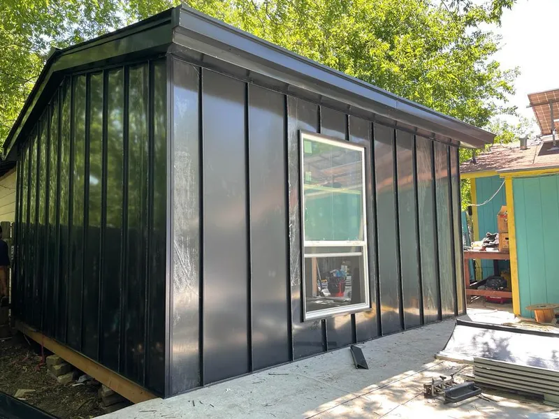 Black standing seam metal wall panels for Metal Roof Installation in Round Lake Beach